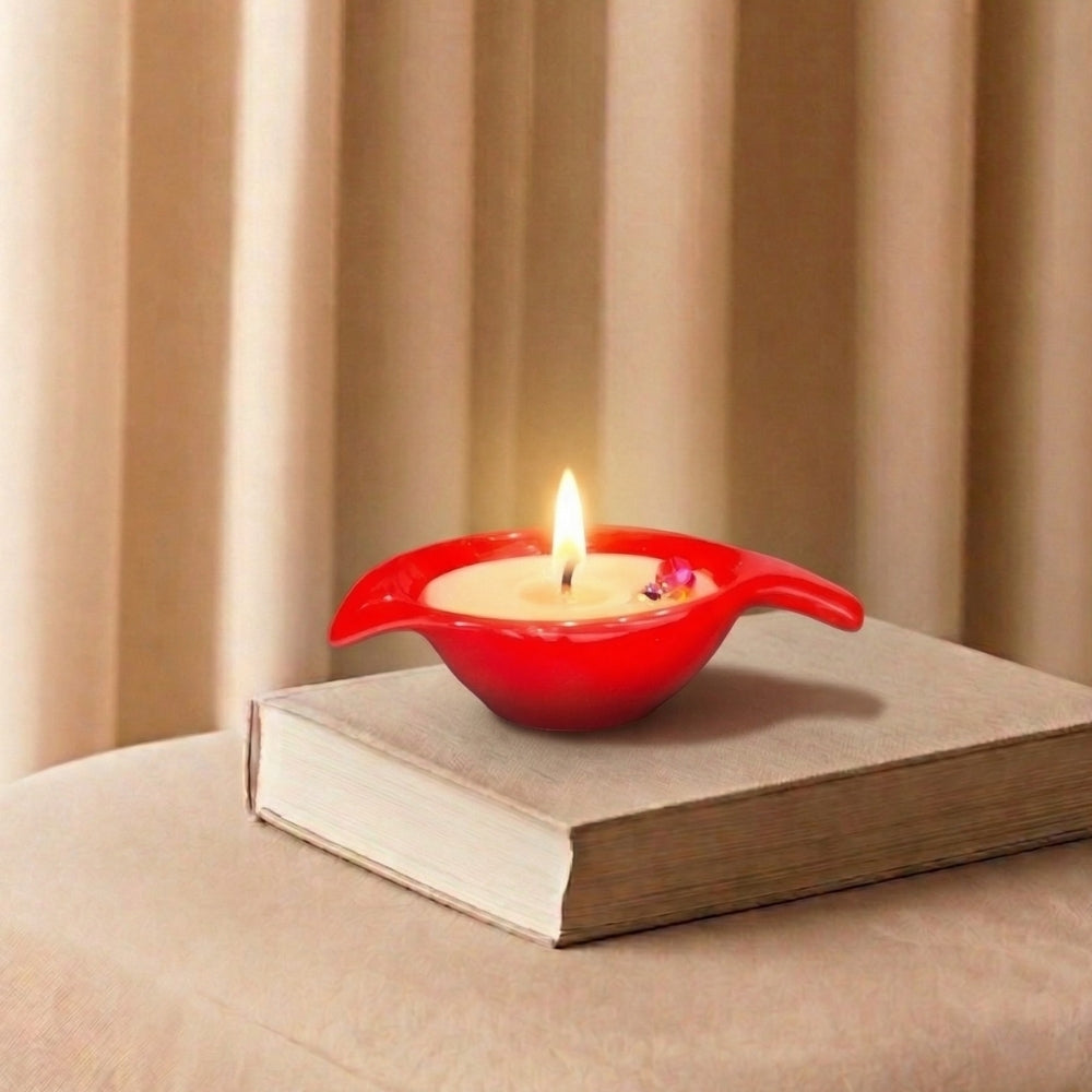 red leaf shaped ceramic candle holder with candles for decorative home lighting and table décor